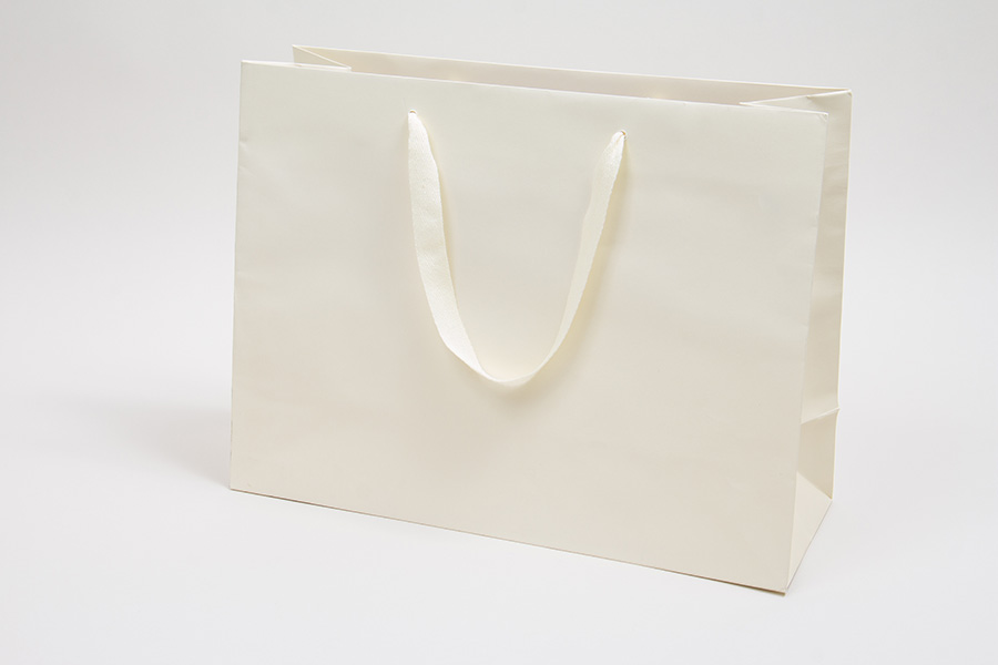 16 x 6 x 12 MATTE IVORY TINTED PAPER EUROTOTES - TWILL RIBBON HANDLES