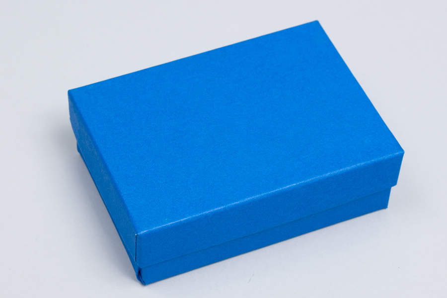 Our two-piece cotton filled jewelry boxes have a beautiful matte cobalt  blue finish and arrive set-up and ready to use. These boxes come with plush 