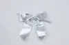 3" X 2-3/4" METALLIC SILVER PRE-TIED BOW CLEAR TWIST TIE