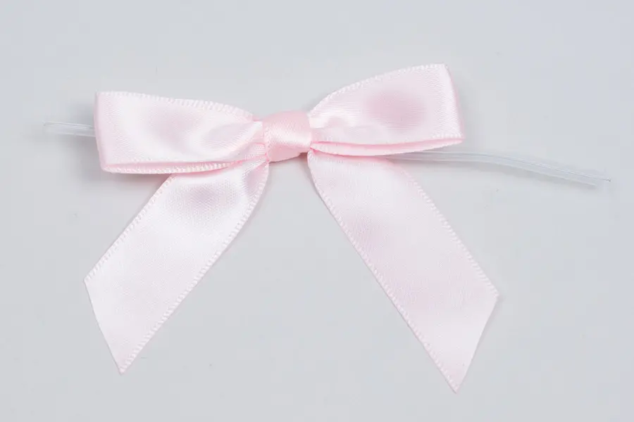 2-1/2" X 2" SATIN LIGHT PINK PRE-TIED BOW CLEAR TWIST TIE