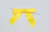 2-1/2" X 2" SATIN DAFFODIL PRE-TIED BOW CLEAR TWIST TIE