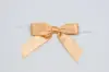 2-1/2" X 2" SATIN GOLD PRE-TIED BOW CLEAR TWIST TIE