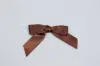 3" X 2-3/4" SATIN BROWN PRE-TIED BOW CLEAR TWIST TIE