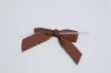 3" X 2-3/4" SATIN BROWN PRE-TIED BOW CLEAR TWIST TIE