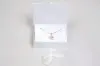 5X3-1/2X1-1/2 MATTE WHITE W/ WHITE PLATFORM AND RIBBON JEWELRY BOX